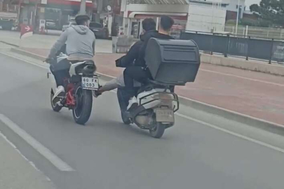 Bursa’da bozulan motosikleti ayağıyla iterek götürdü!