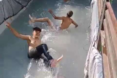 Bursa'da bunaltan sıcaklarda ilginç serinleme yöntemi