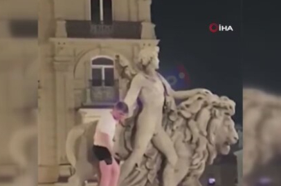Belçika'da alkollü turist tırmandığı heykelin kolunu kırdı
