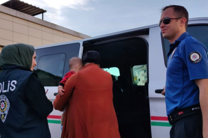 Bursa'da çalıştığı depoyu soydu: Bebeğiyle cezaevine götürüldü