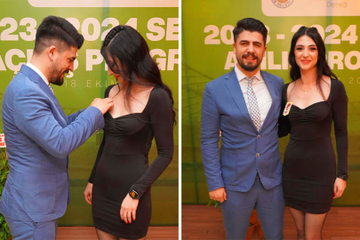 Eşinin kokartını kendi elleriyle taktı