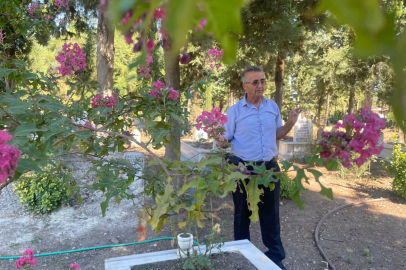 Oğluna adadığı mezarlığı, adeta parka dönüştürdü!