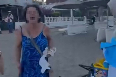 Plajda sözlü tartışma: Sandalyeyi fırlattı!