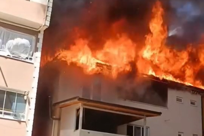 Bursa'da 3 katlı binanın çatısı alevlere teslim oldu