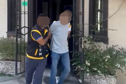Yakalanmamak için saçını kazıttı ama polisten kaçamadı!