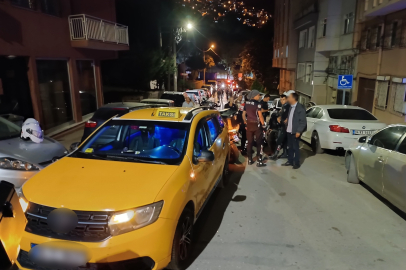 Bursa'da taksiden ateş açan şahıs silahlarla yakalandı