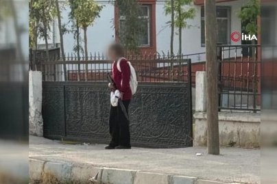 Elinde silahla okula gelen öğrenci böyle görüntülendi