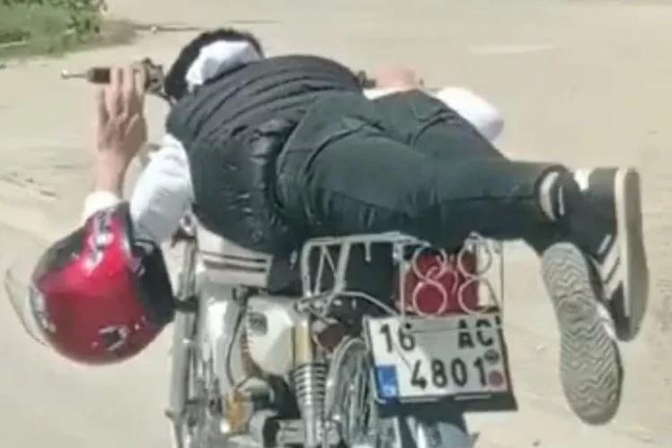 Motosiklet üzerinde akrobatik hareketler yapan sürücüye ceza